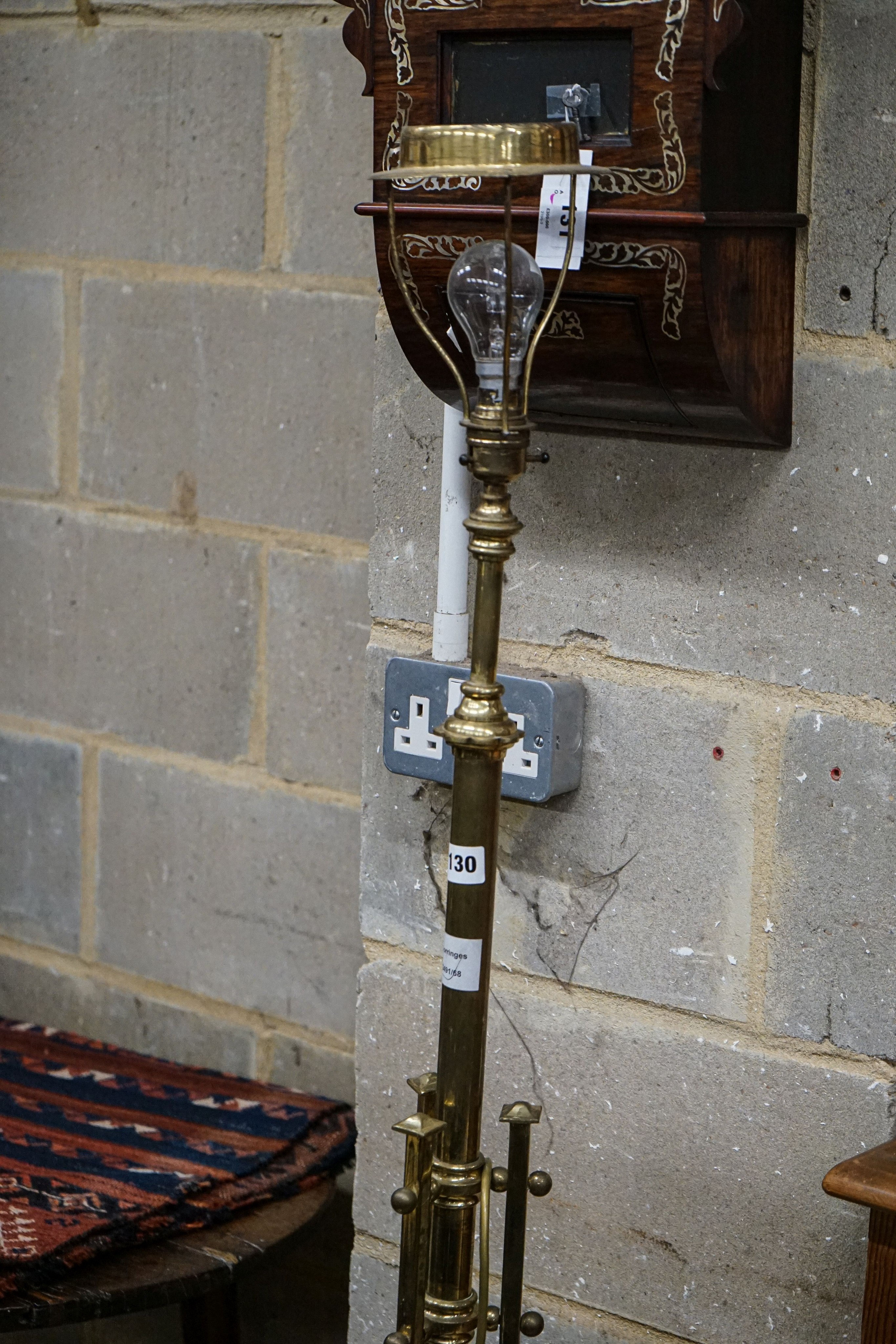 An Edwardian lacquered brass telescopic lamp standard, height 136cm